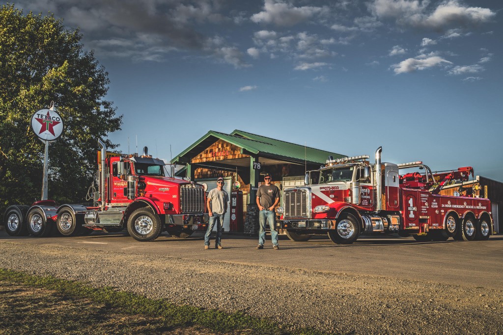Owner operators with Kenworth and tow truck at The Owner Op Shop